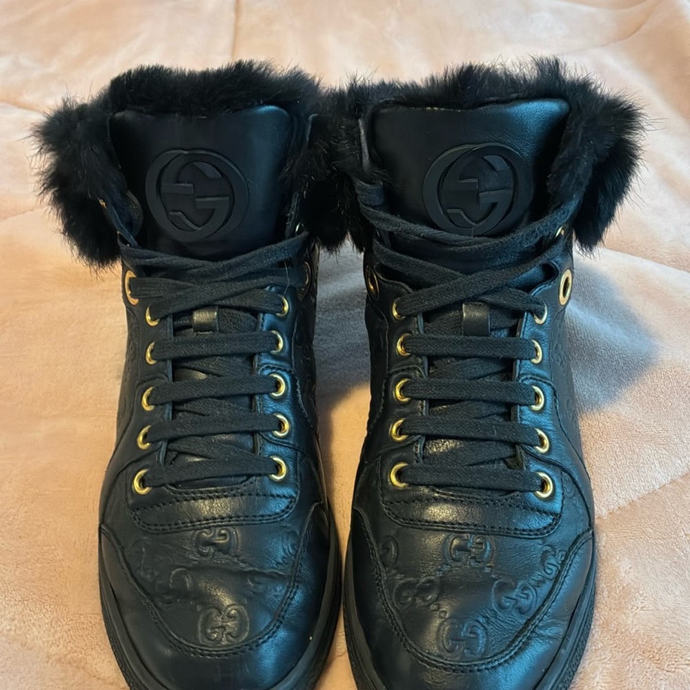 Leather Gucci high top sneakers with fur trim